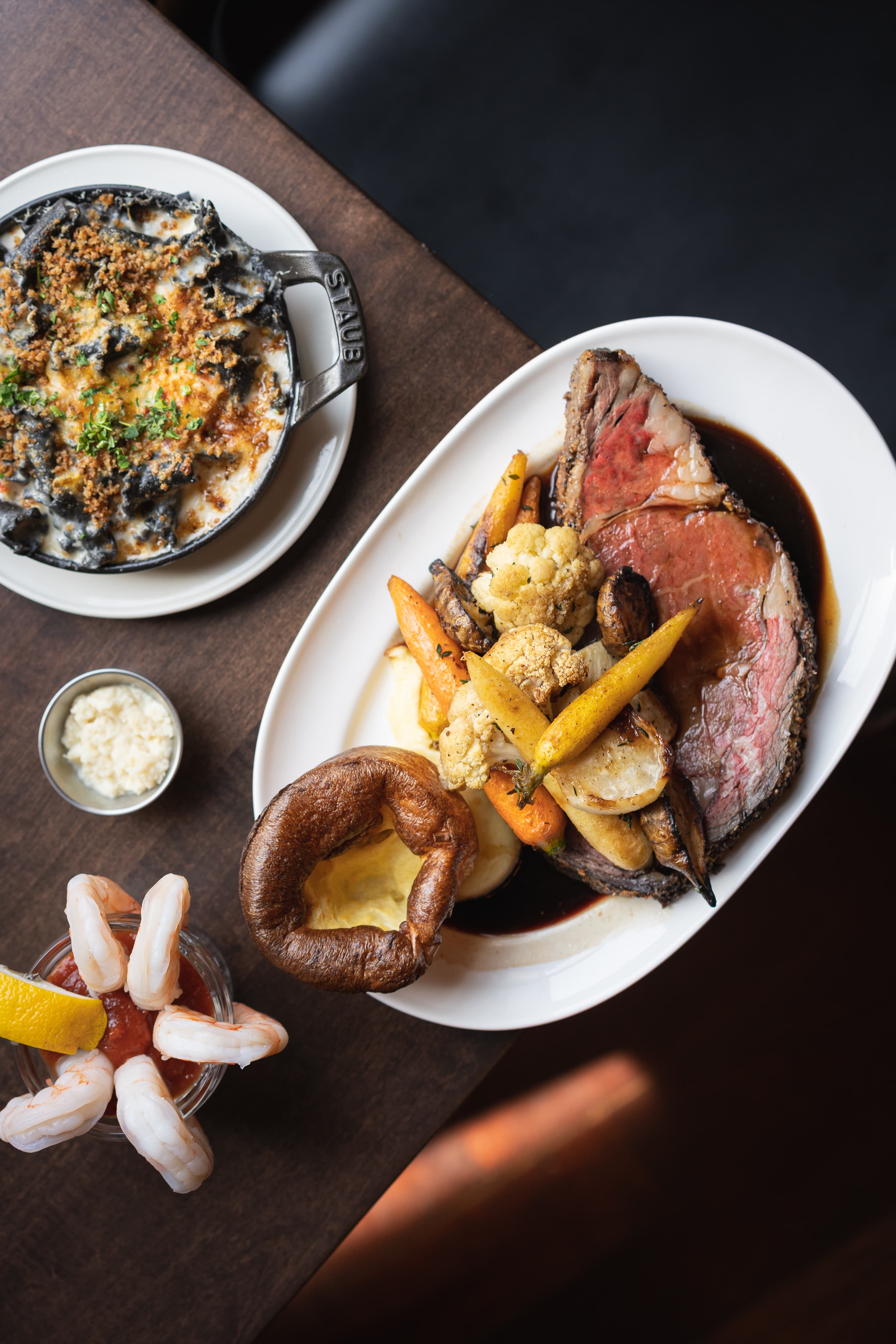 Sunday Roast spread at The Berczy Tavern — prime rib, Yorkshire pudding, mac and cheese, and shrimp cocktail